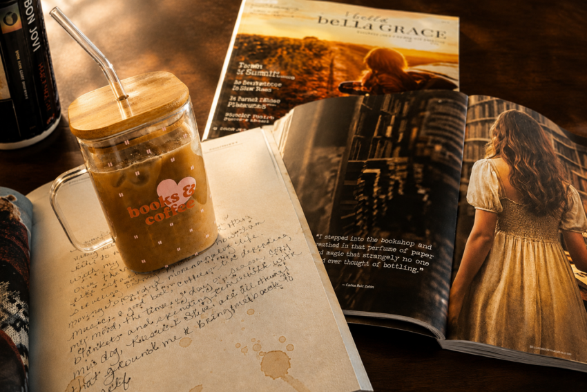 Books & Coffee iced coffee resting on a handwritten journal beside a Bella Grace Magazine, representing the quiet rituals of my Bella Grace Summer